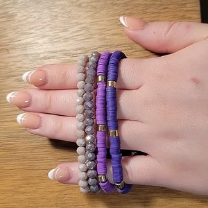 Heishi and beaded purple bracelets. 4 total